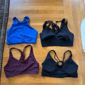Athleta Bundle of Four Sports Bras in Blue, Black, Plum - Size M